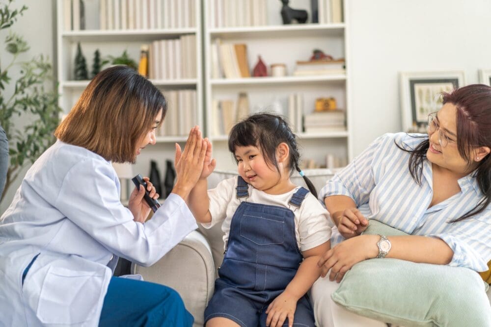 Mental Health Counselor for Children Discussing Care Strategies with Young Girl