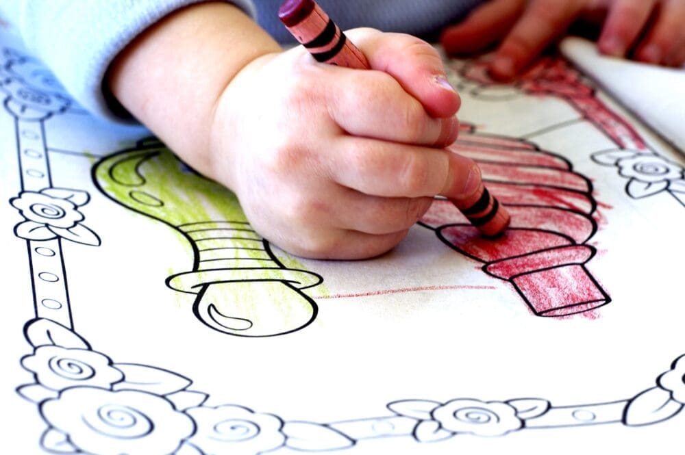 Play Therapy Supervision Child Engaged in Creative Coloring Activity